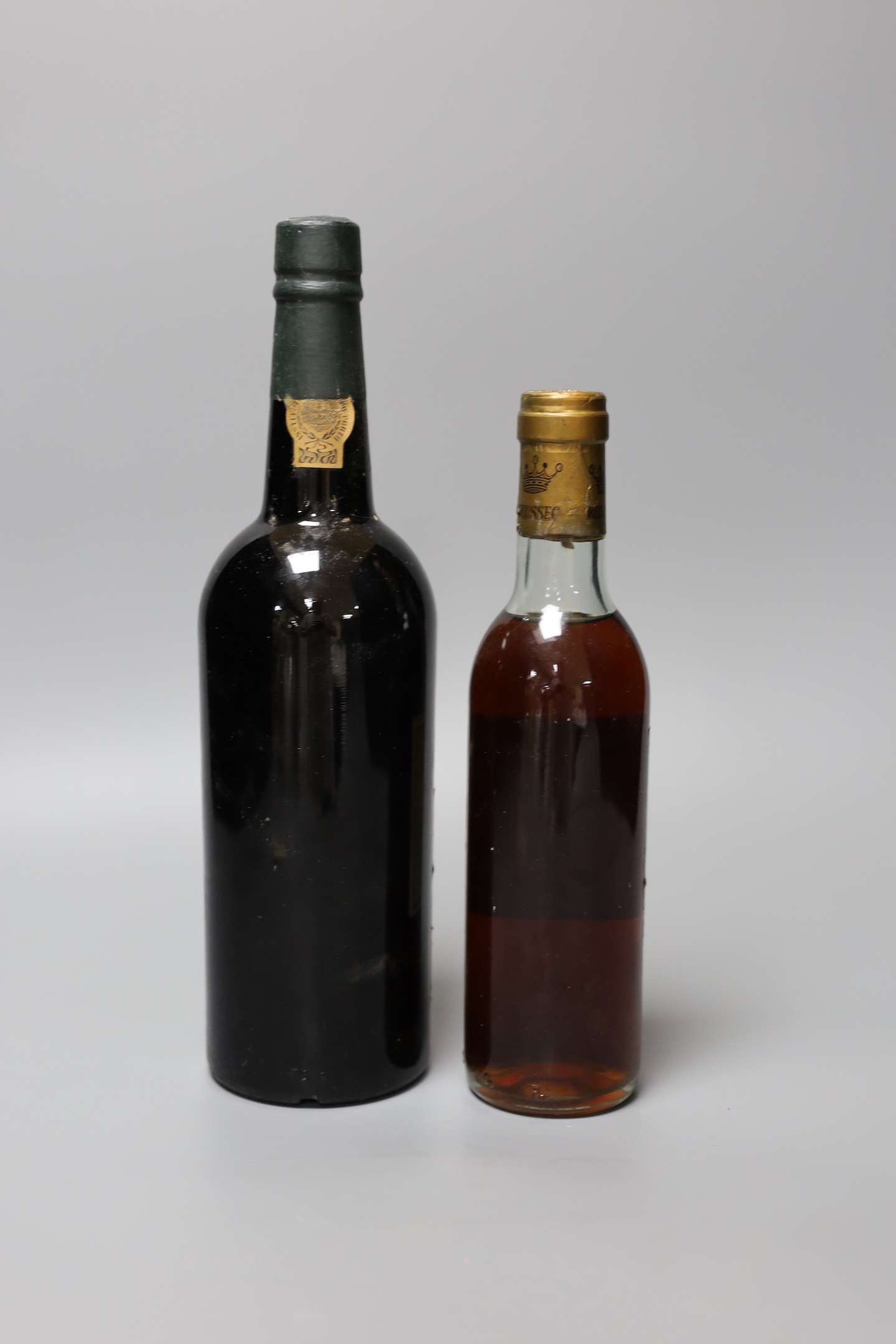 A bottle of 1977 Taylor's Port, 75cl, together with a bottle of 1976 Sauternes, 30cl